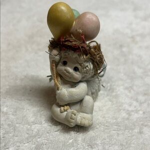 Vintage Dreamsicles "Pint Sized Parade" cherub figurine with balloons.